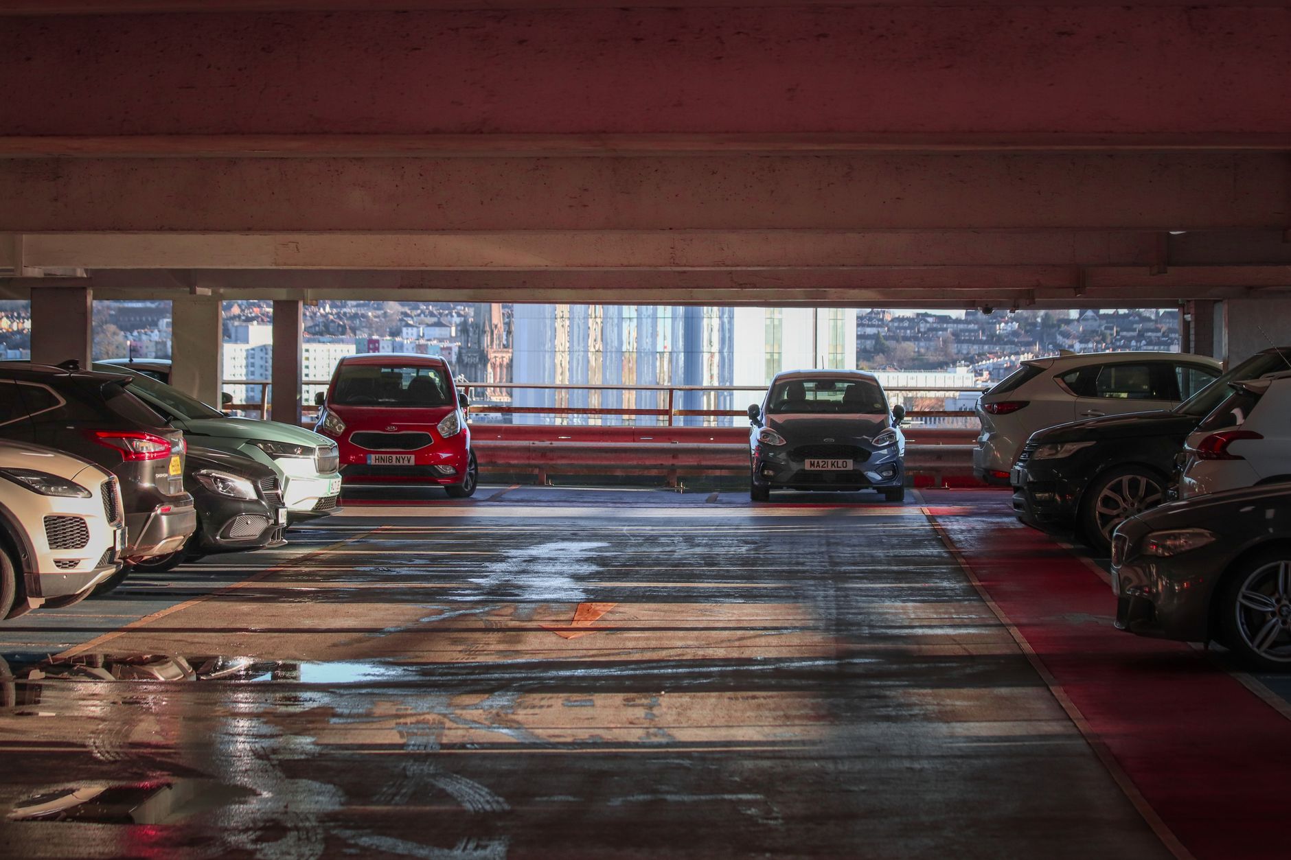 Cars parked inside a parking garage