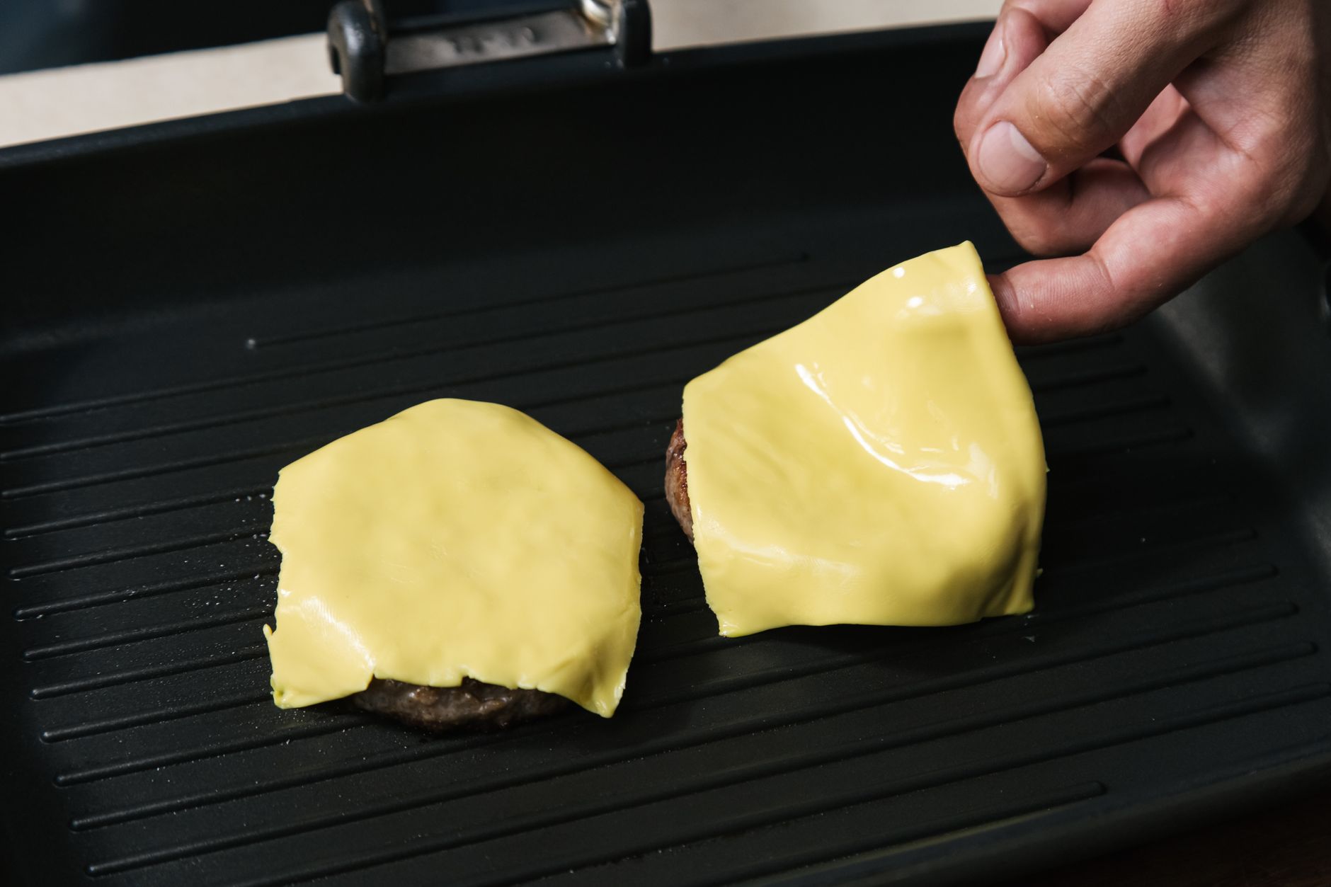 Cheeseburgers on a grill pan