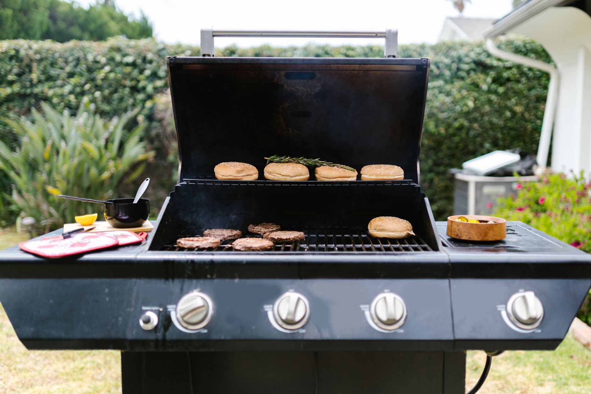 Best grill cover: a gas grill on a backyard patio