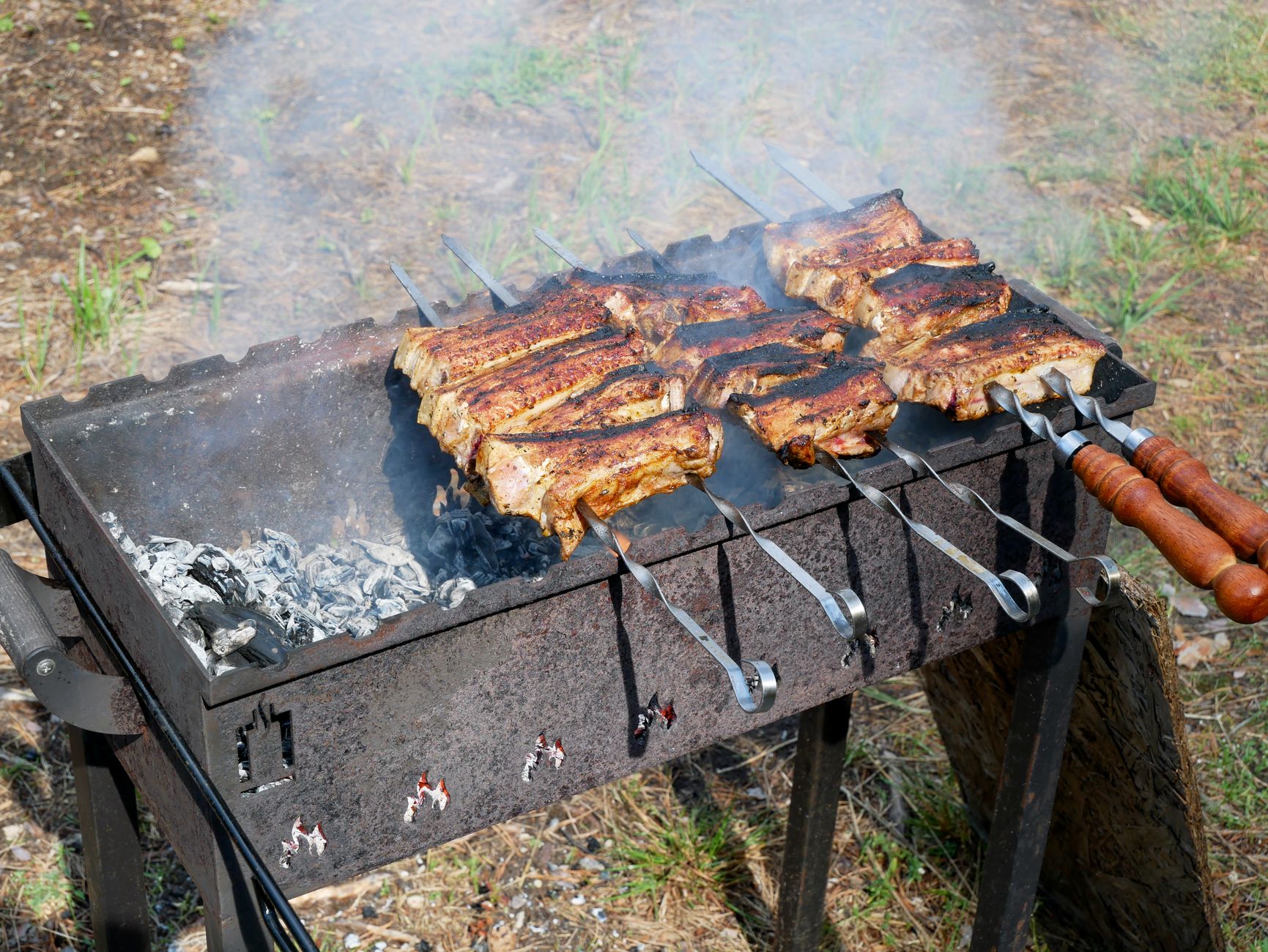 Pork skewers on a charcoal grill