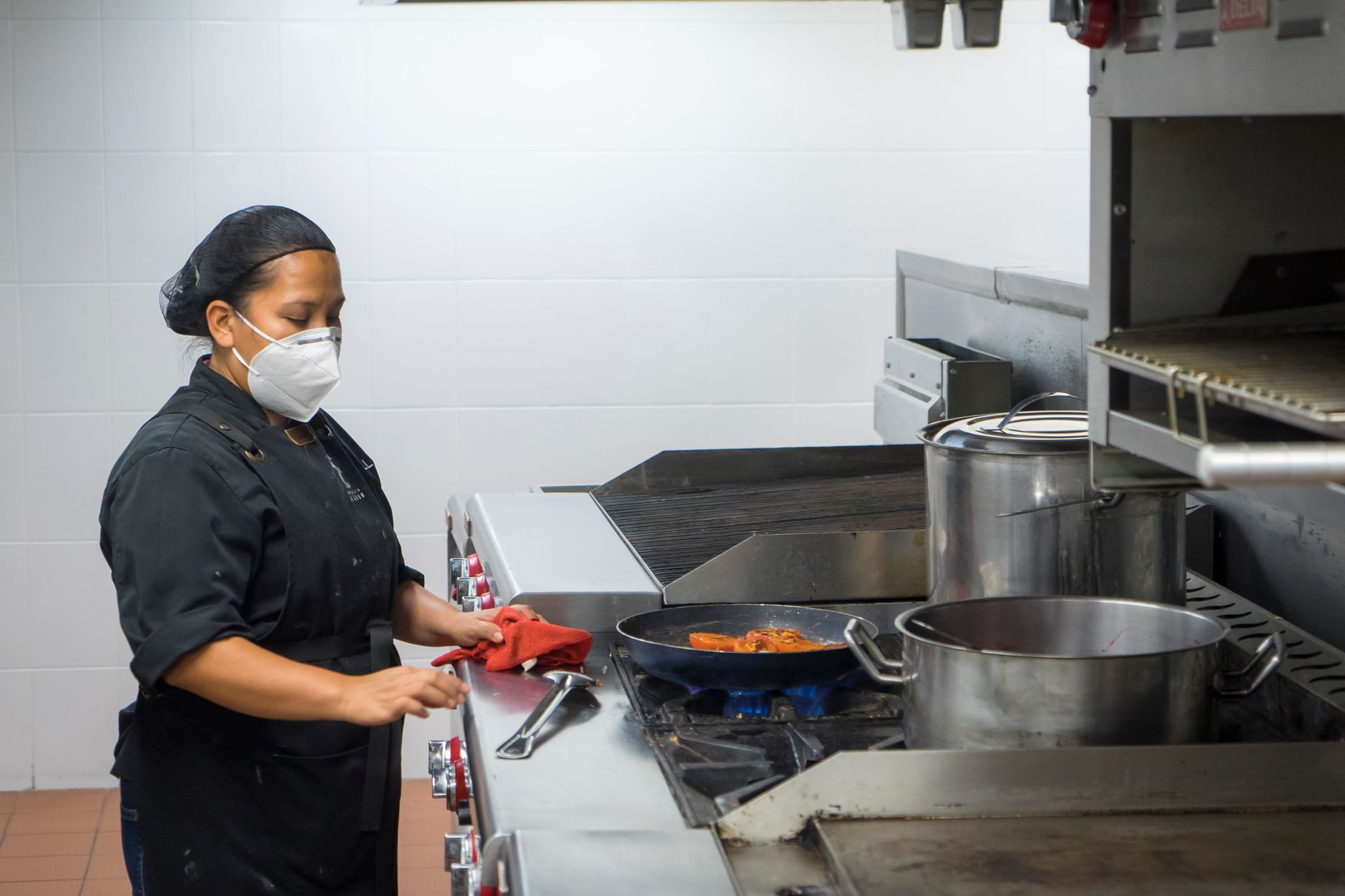 Chef cooking in a commercial kitchen