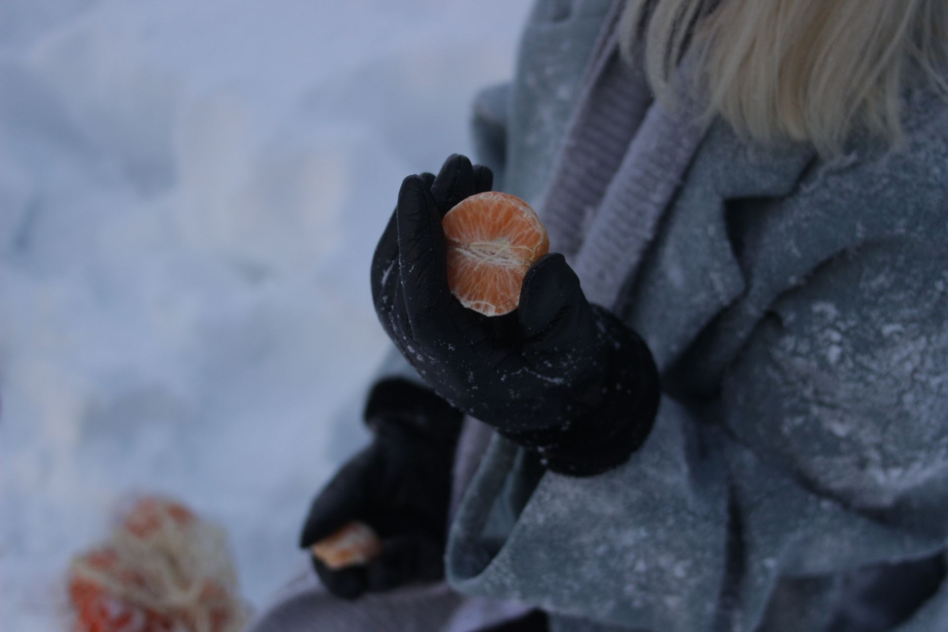 Best hand warmers guide: gloved hands outdoors in the snow