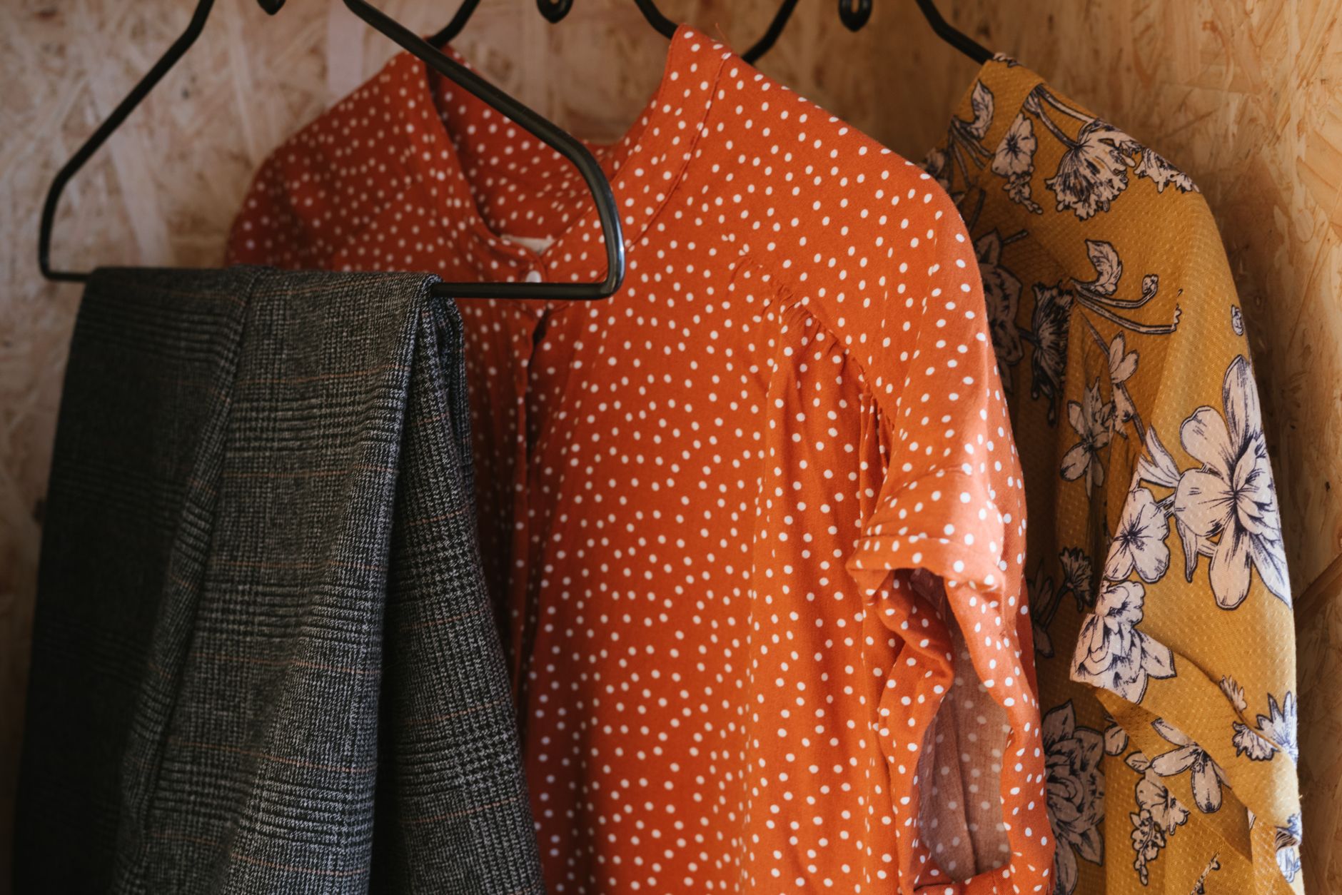 Shirts hanging in a home closet