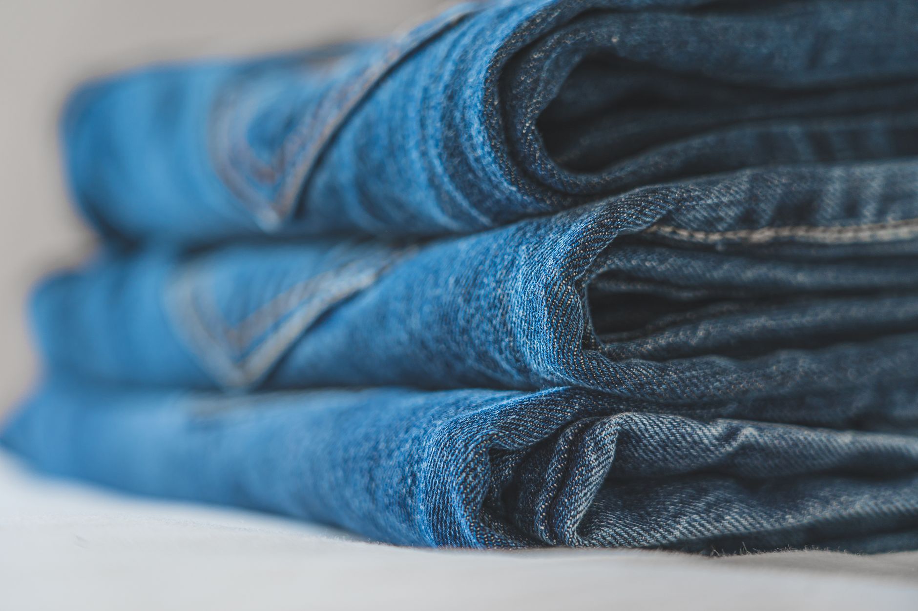 Trousers hanging in a closet