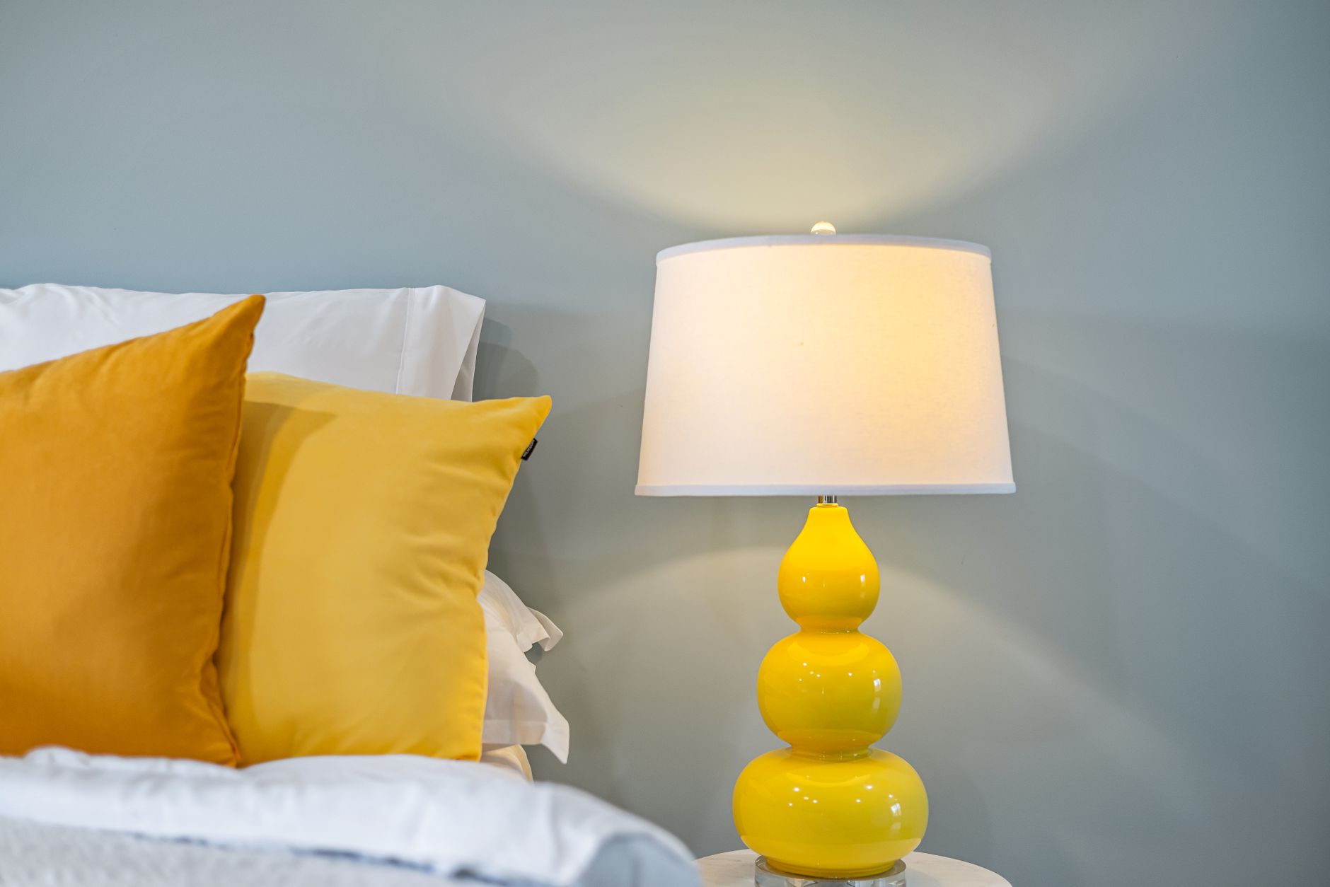 Pillows stacked against the head of a bed