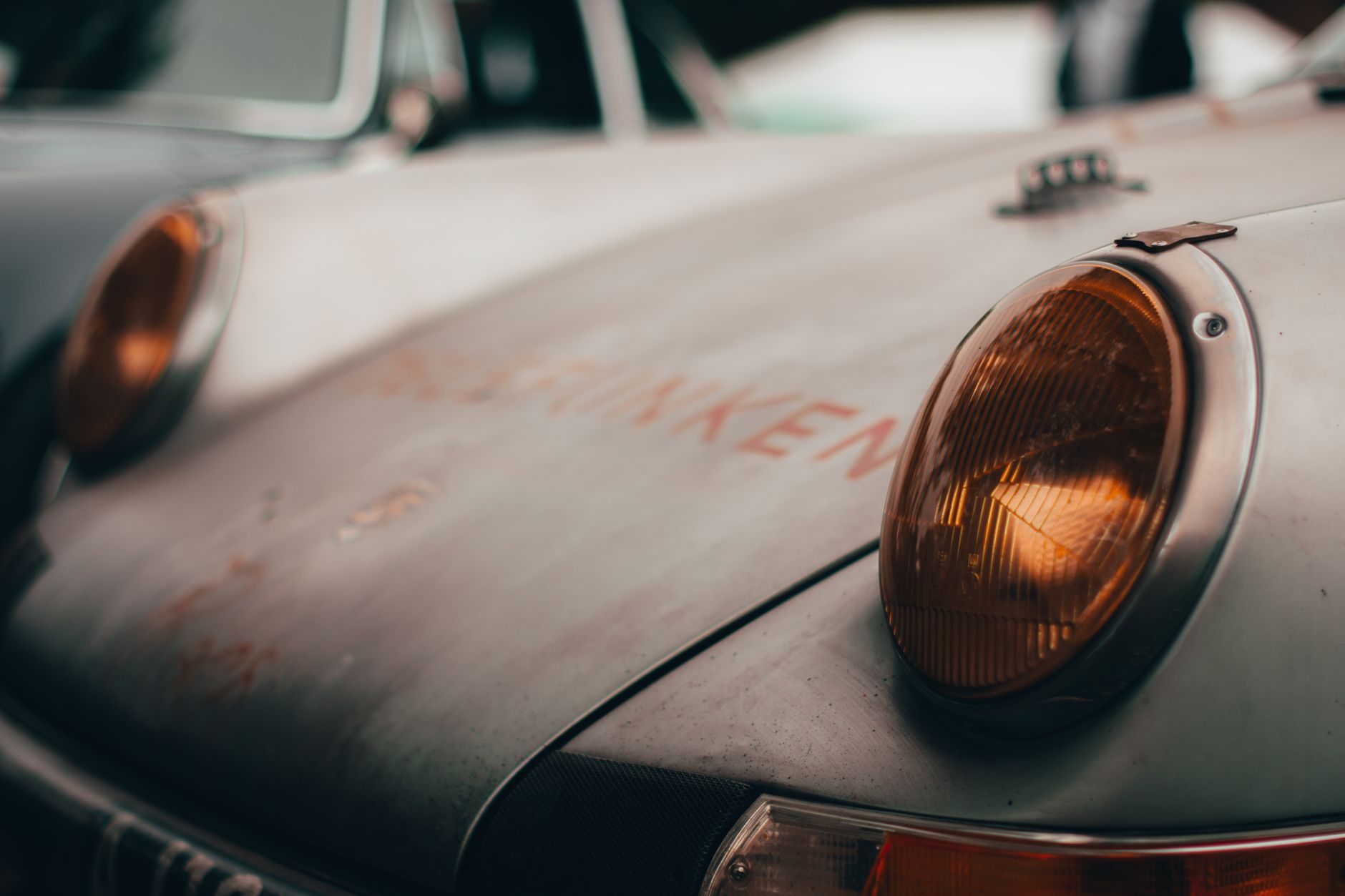 Best headlight restoration kit: a close view of a car headlight lens