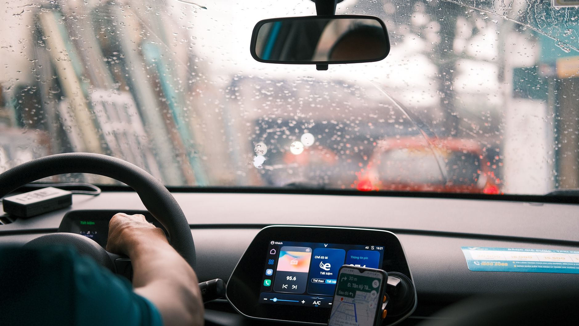 Rain on a windshield with the wipers running