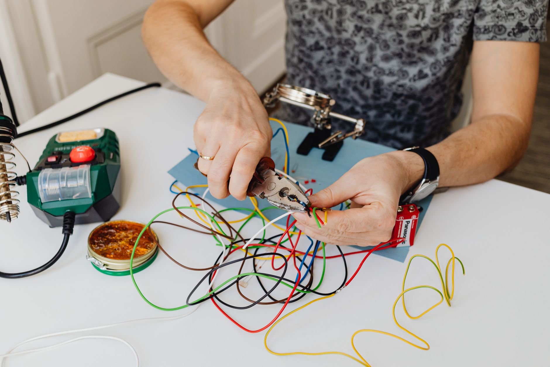 Stripping wires at a soldering station