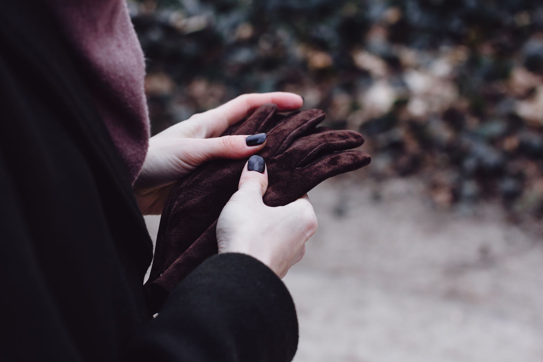 Hands held together for warmth on a cold winter day