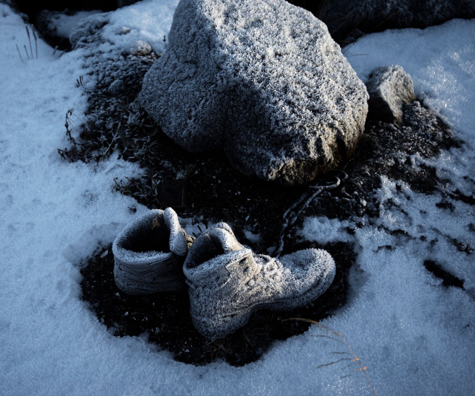 Boots on a snowy winter trail
