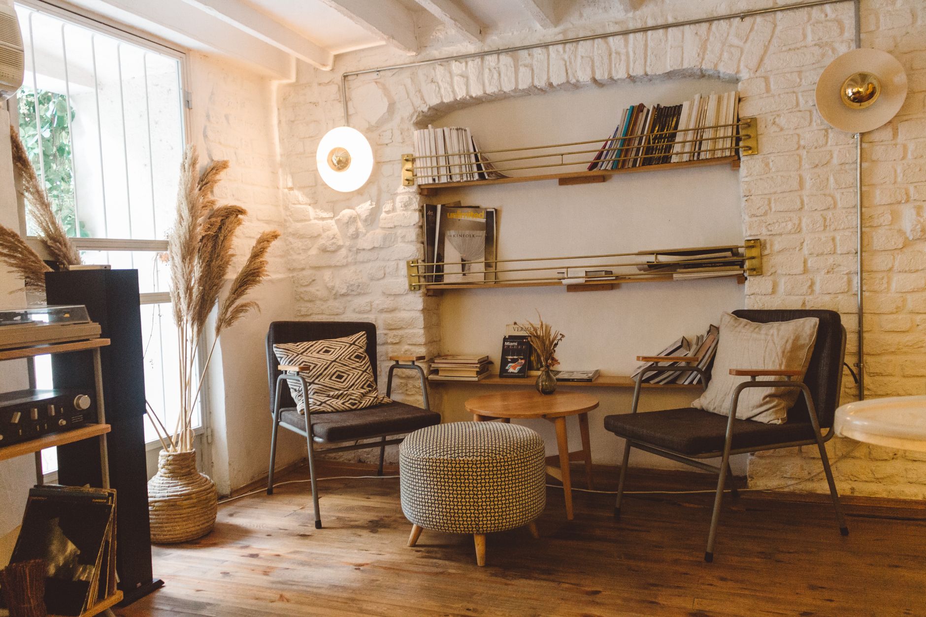 A bookshelf standing against a living room wall