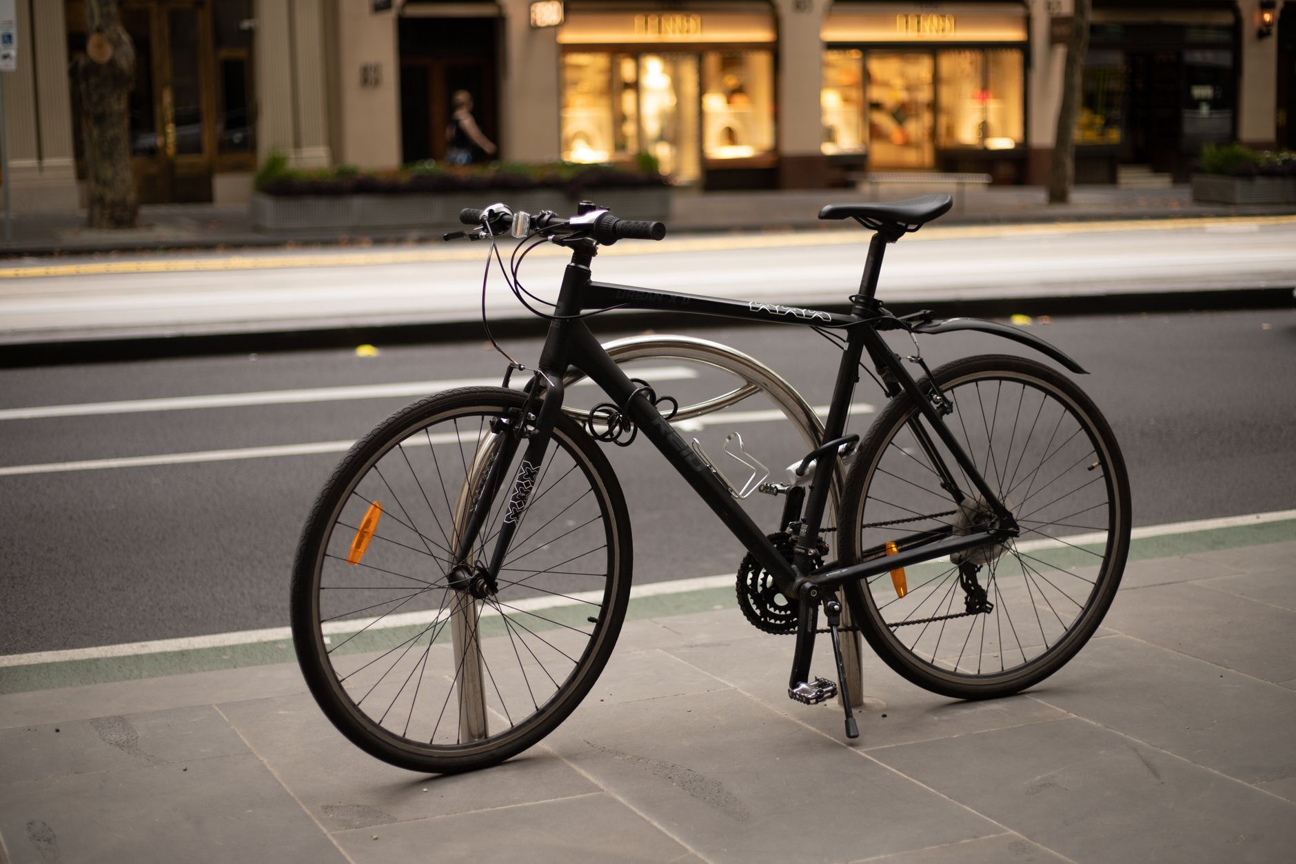 A road bike parked outdoors
