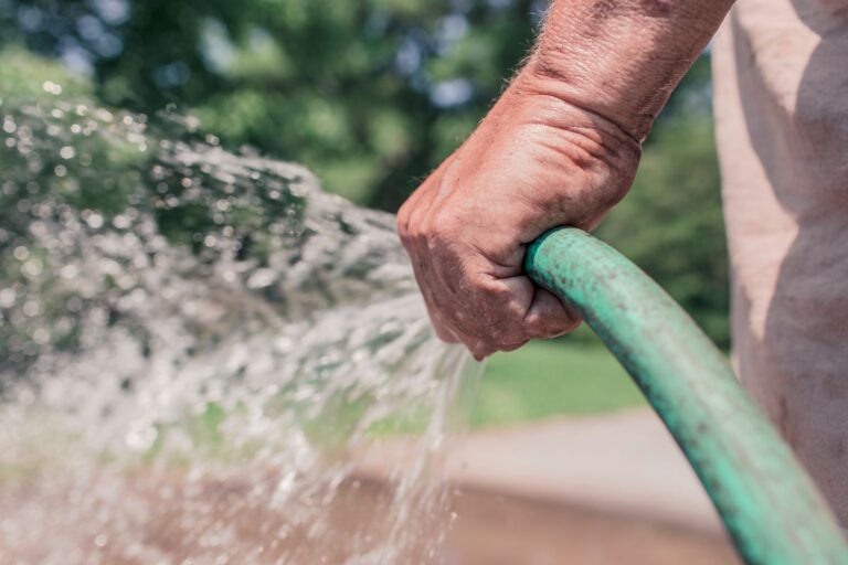 Best hose splitter: water flowing from a garden hose