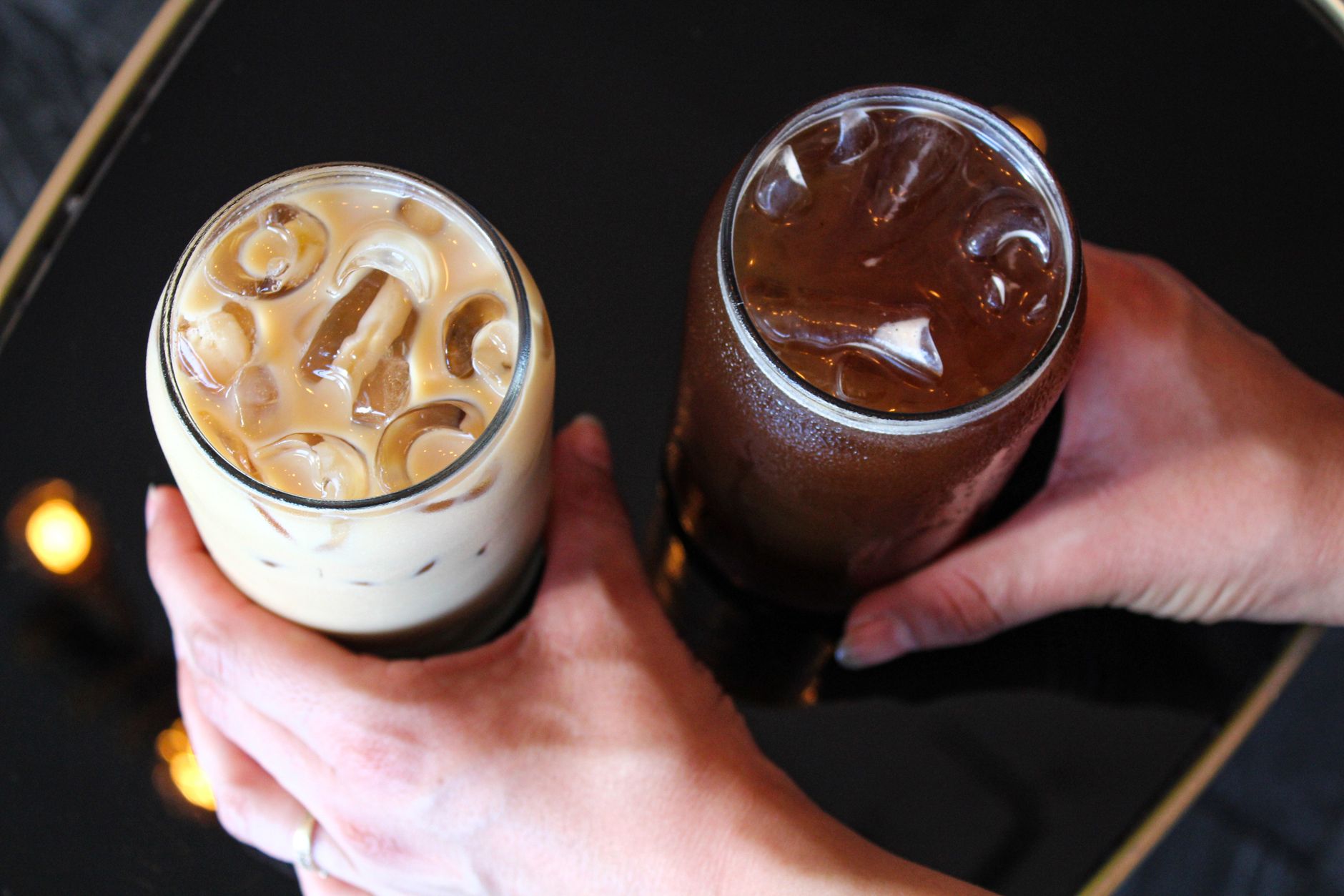 A glass of iced coffee with ice