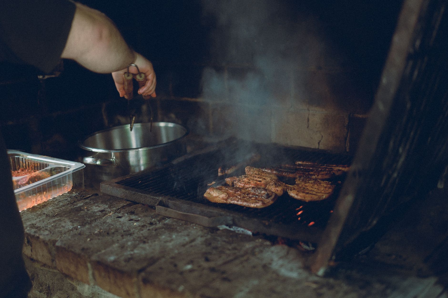 Best indoor grill: meat cooking on a brick grill
