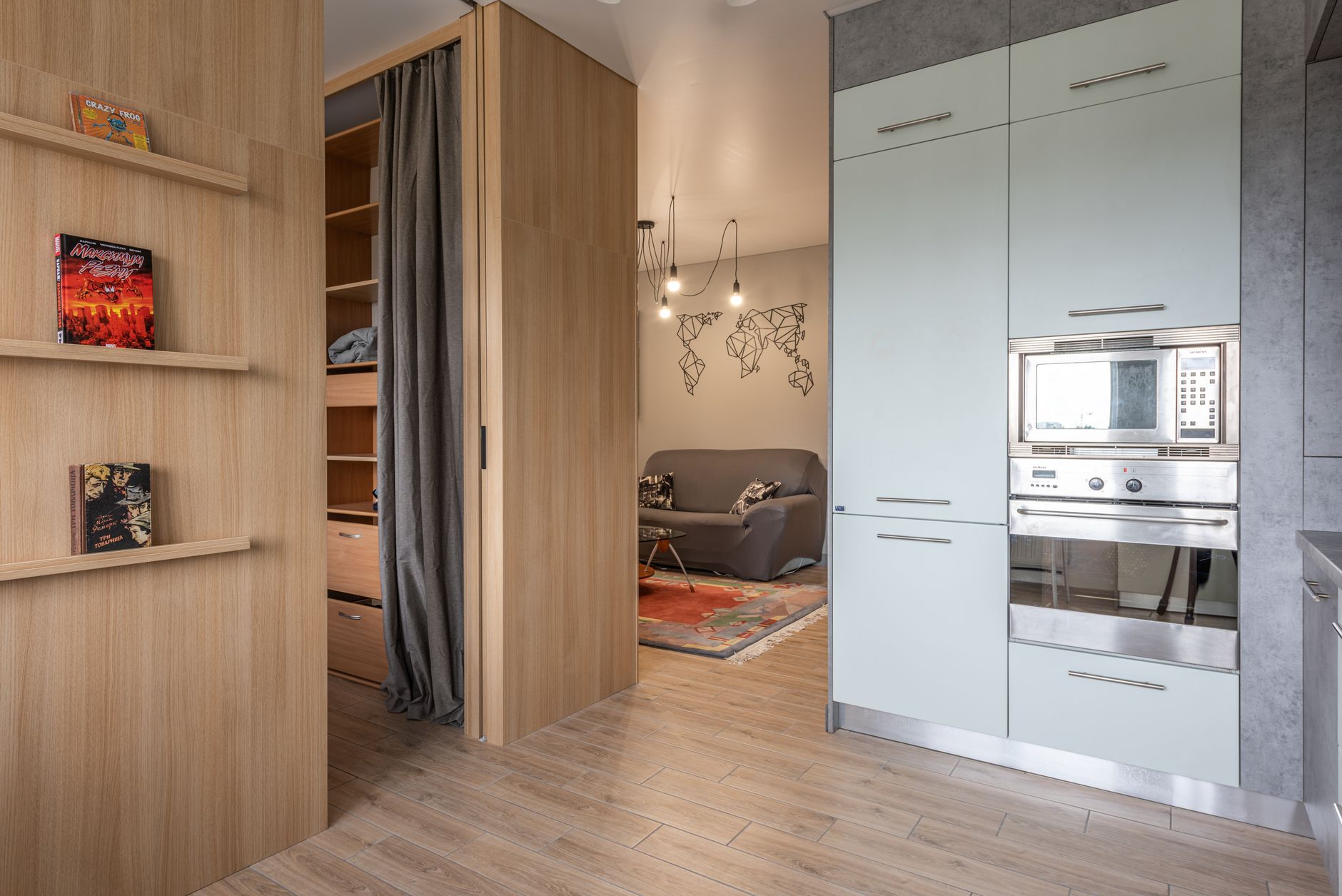 A compact apartment with a kitchen wall