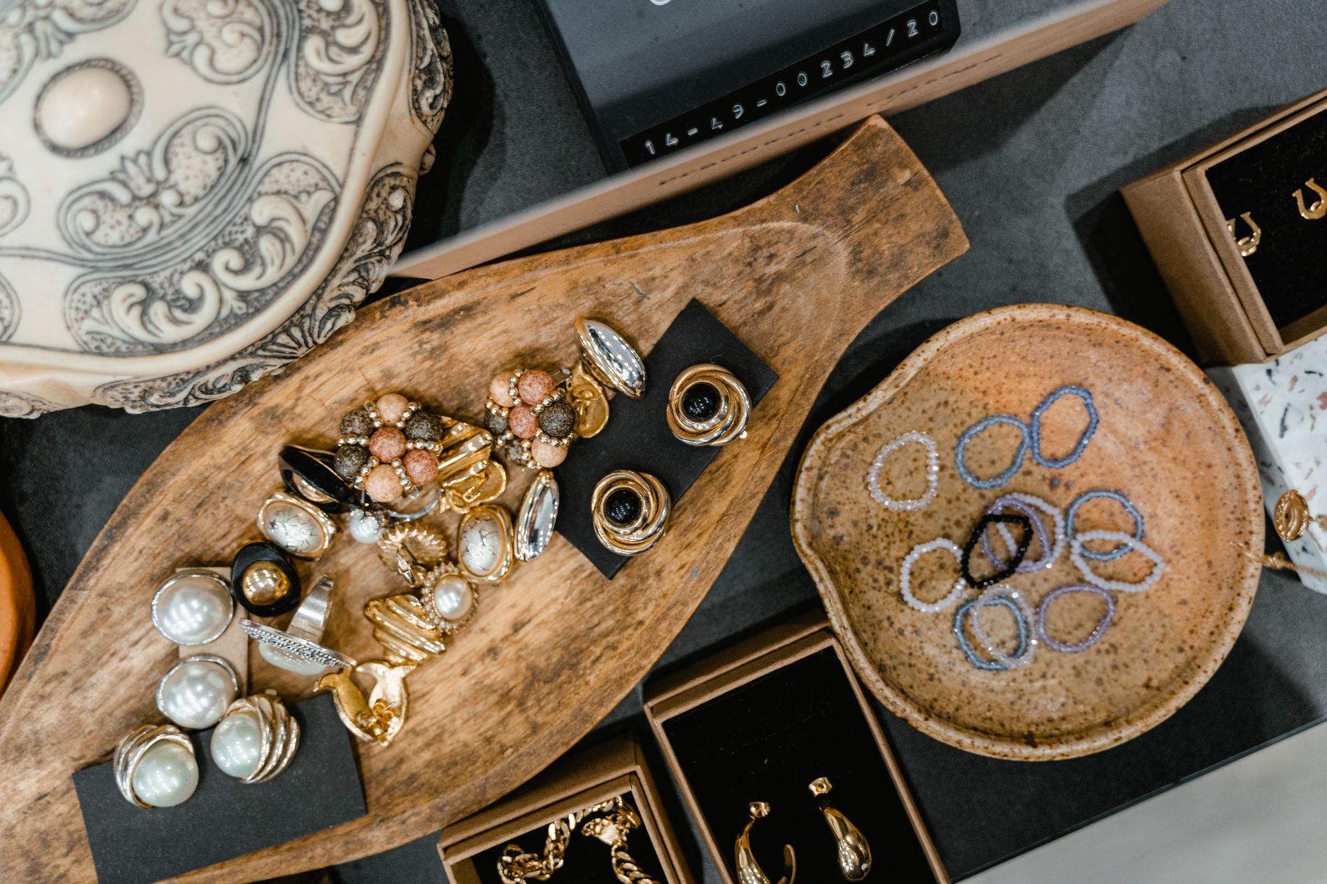 Best jewelry organizer: jewelry stored in a box on a dresser