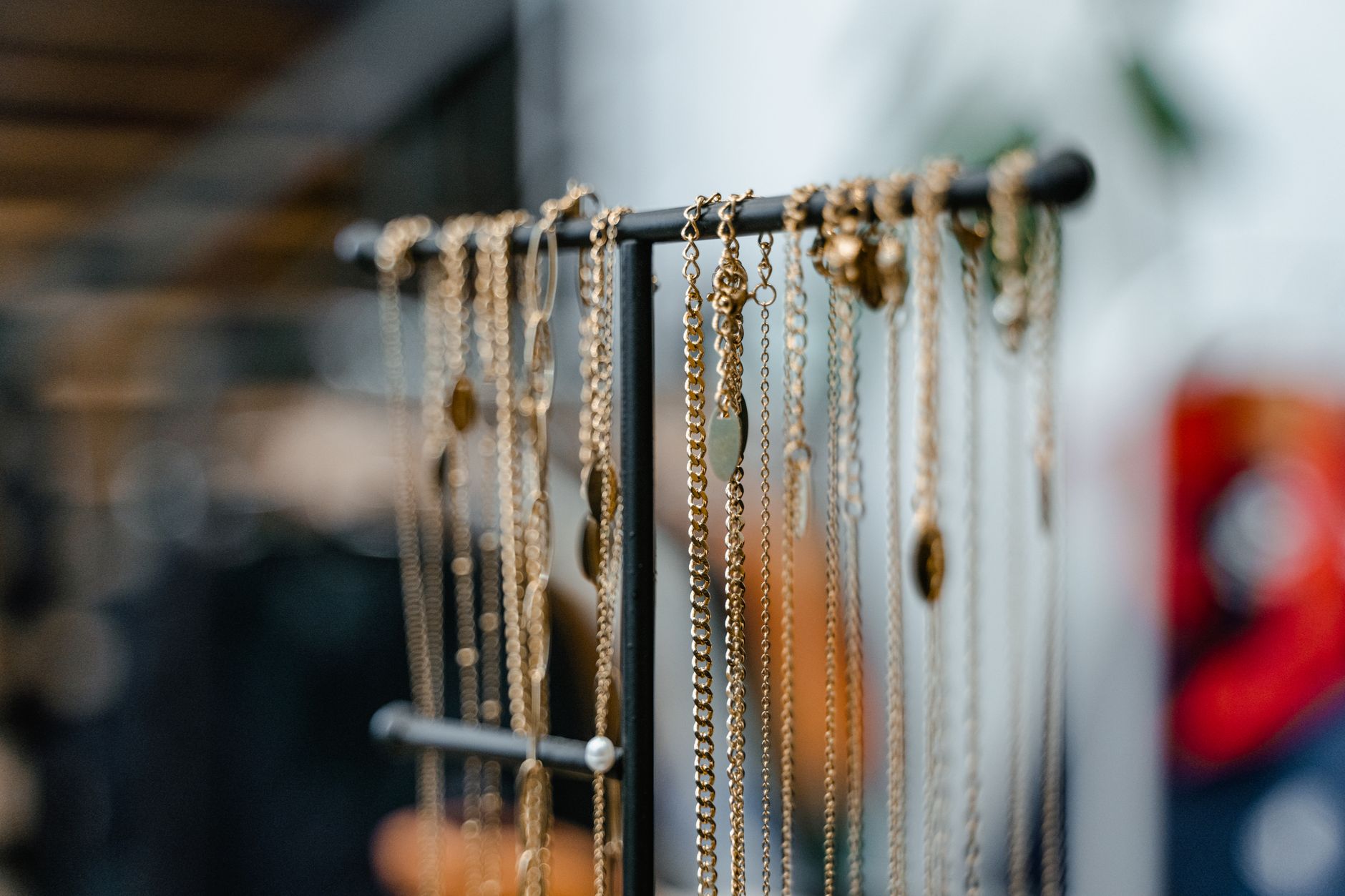 Necklaces hanging side by side