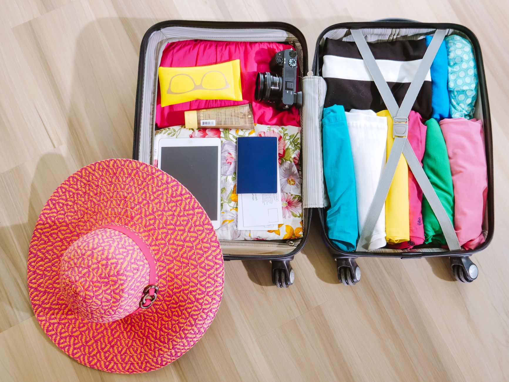 A suitcase being packed for a trip