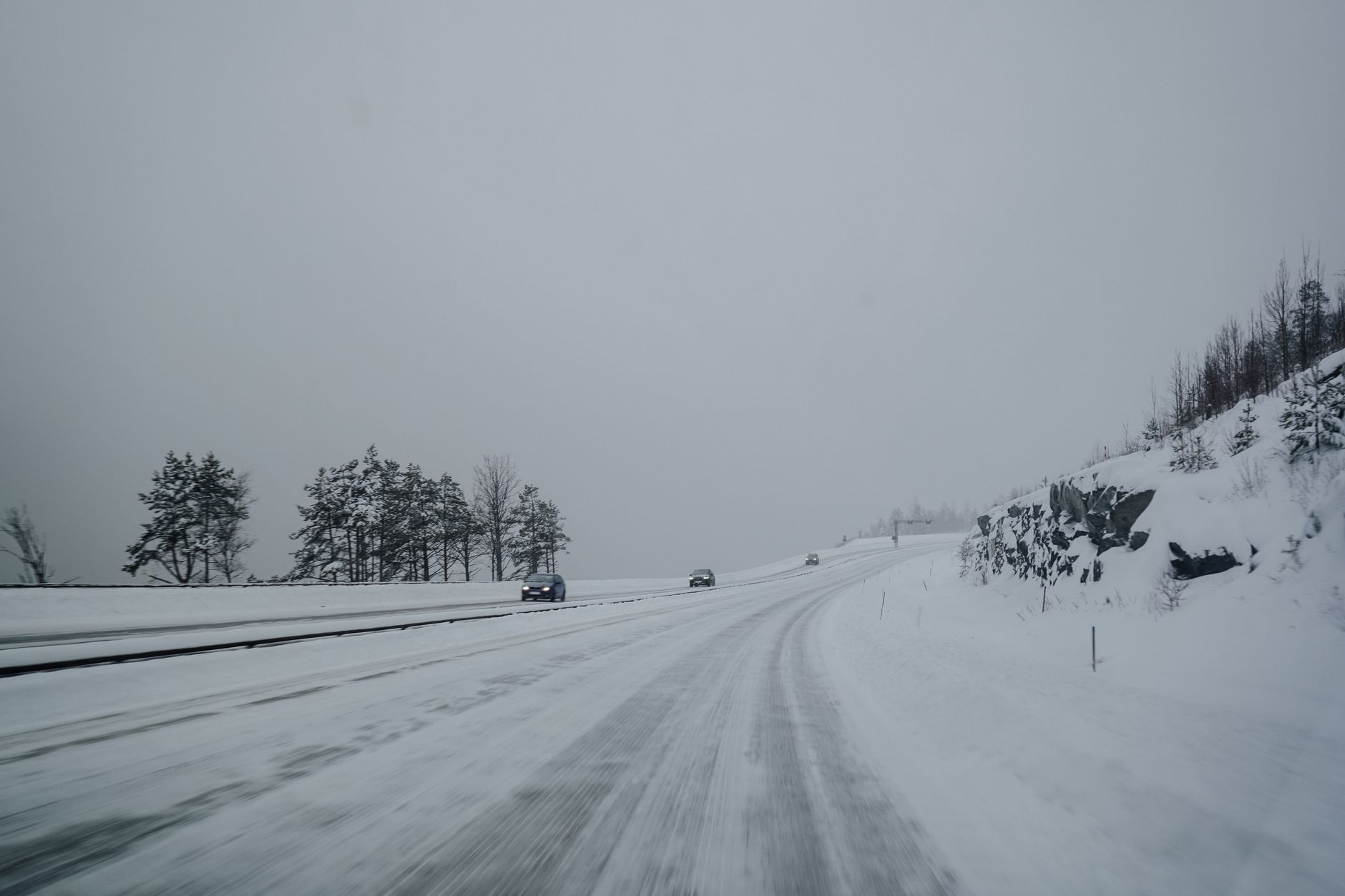 A car driving on a winter road