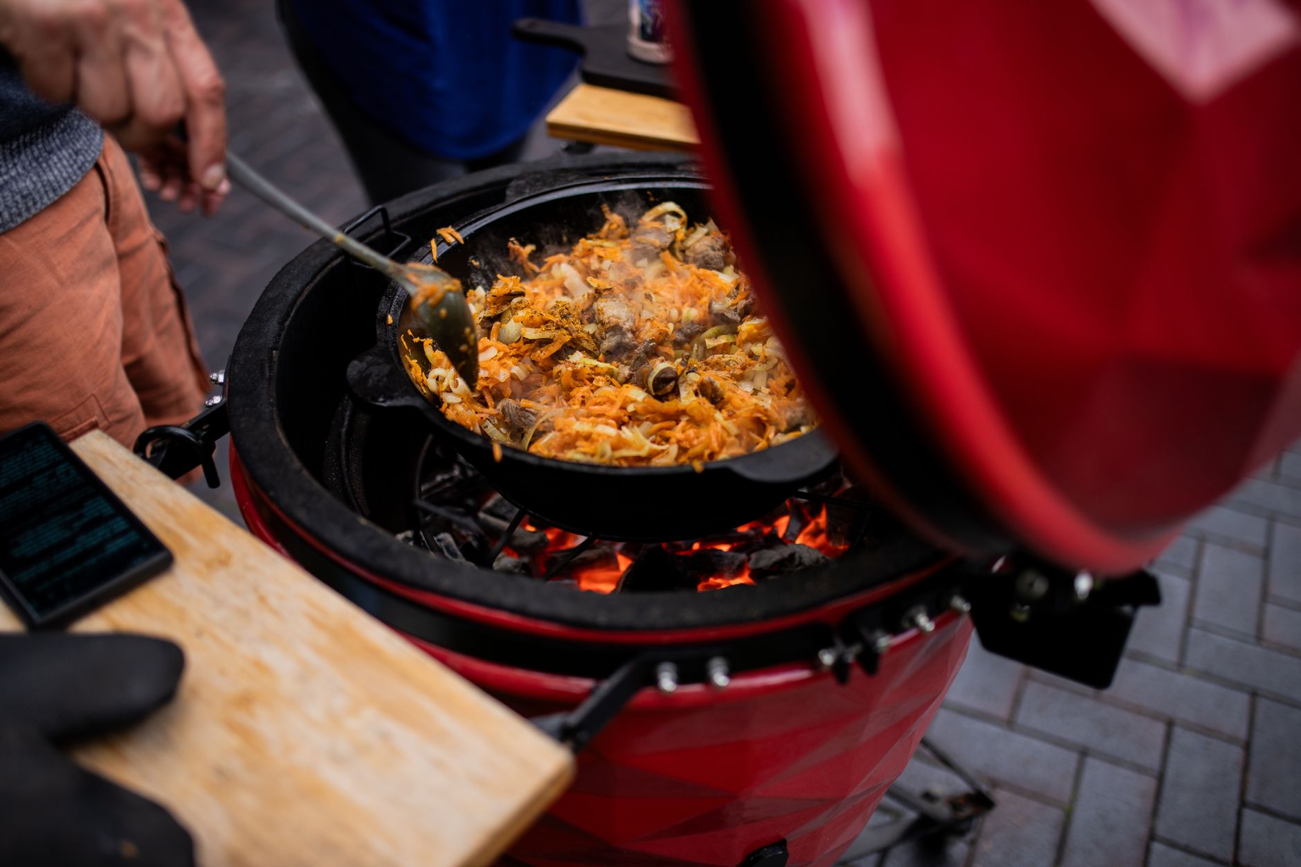 Best kamado grill: cooking on a red ceramic kamado grill