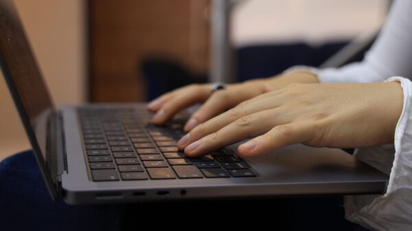 Best wireless keyboard and mouse: hands typing on a keyboard