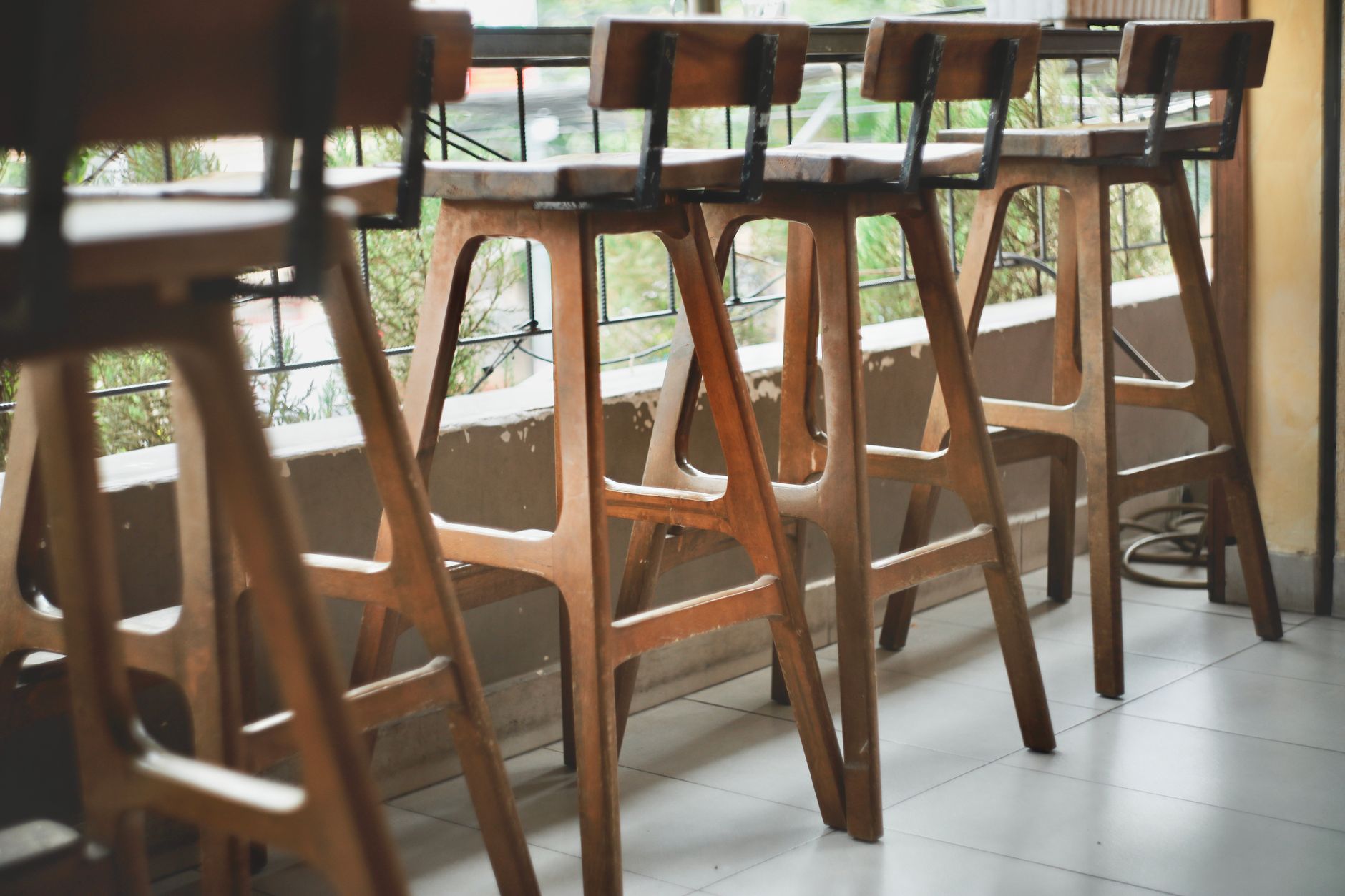 A small wooden stool on a floor