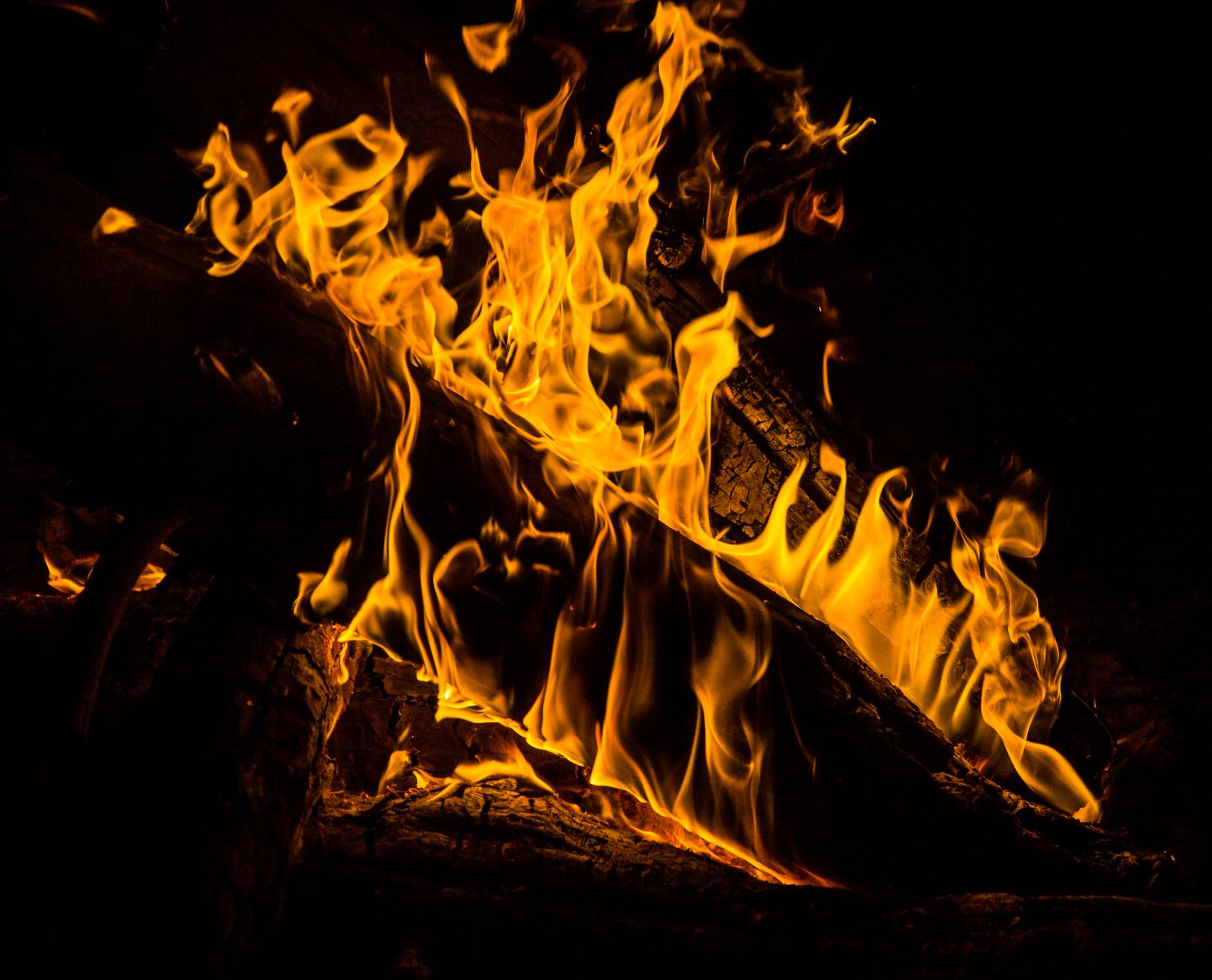 Wood burning in an outdoor campfire