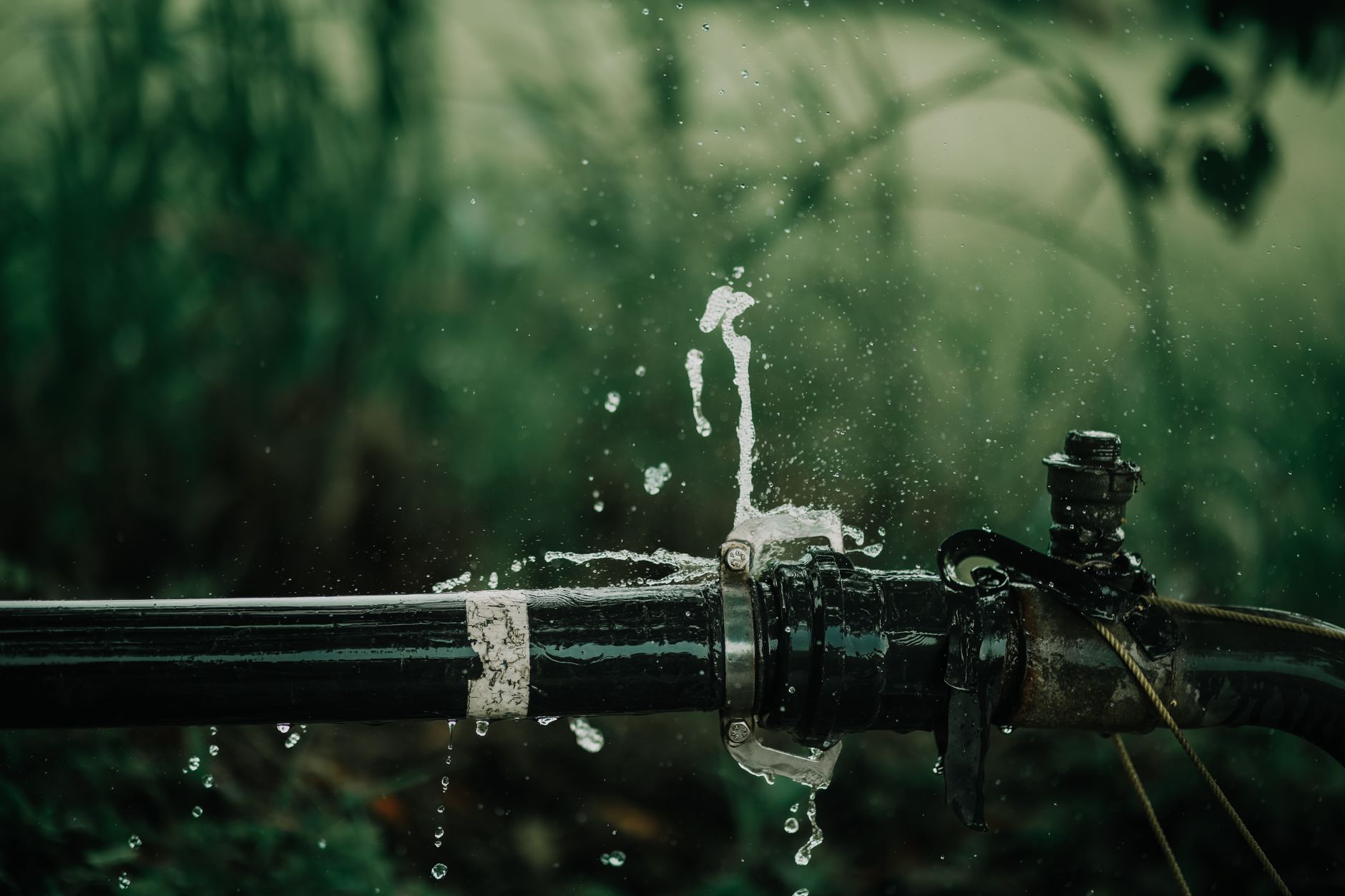 Water spraying from a leaking pipe