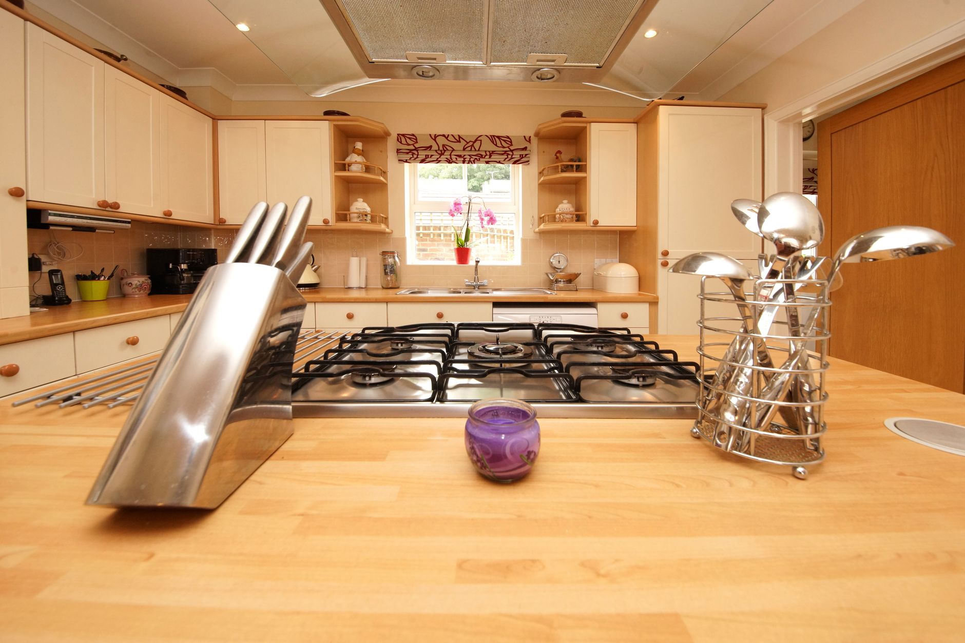 A knife block on a kitchen island