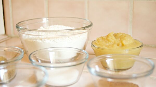 Glass bowls of measured baking ingredients