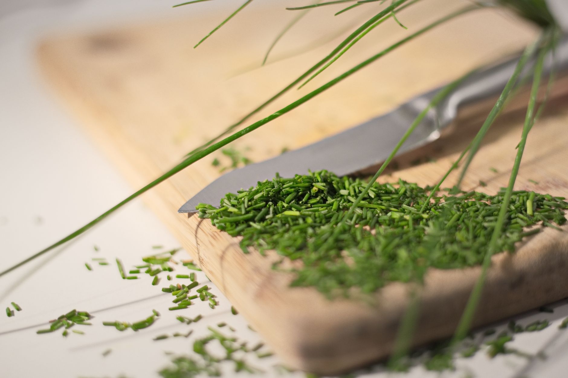 Chopped chives on a cutting board