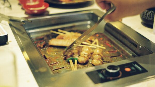 Best kitchen tongs: turning skewers on a tabletop grill