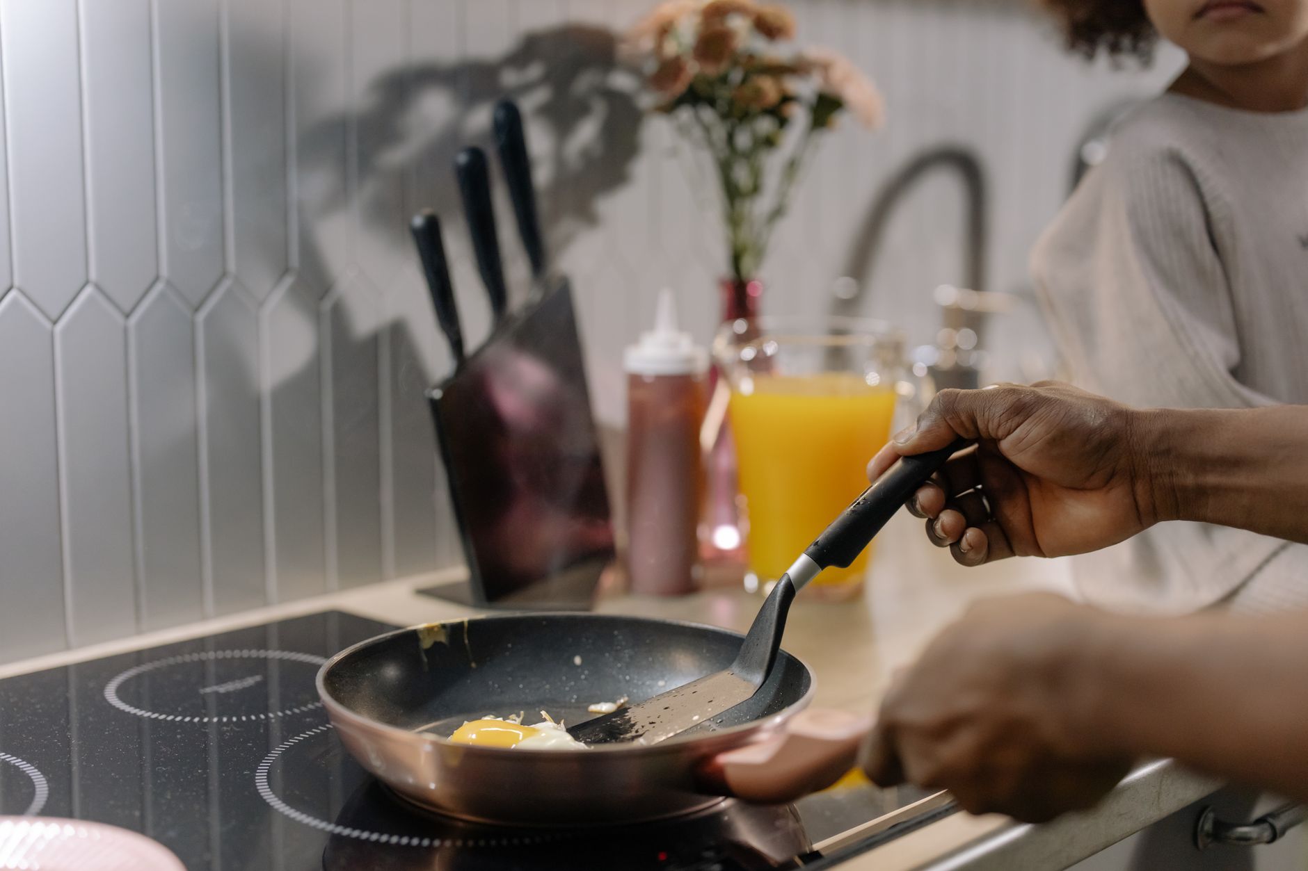 Cooking eggs in a pan on an induction cooktop
