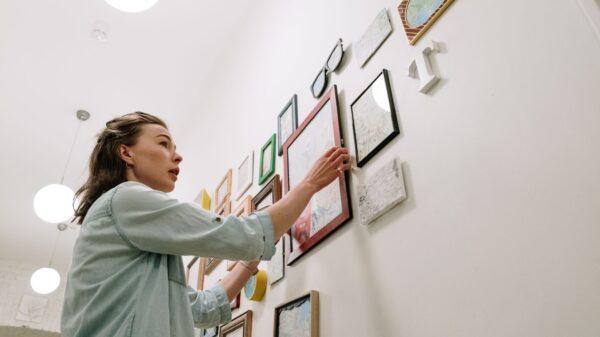 Best laser level: a neat row of picture frames on a living room wall