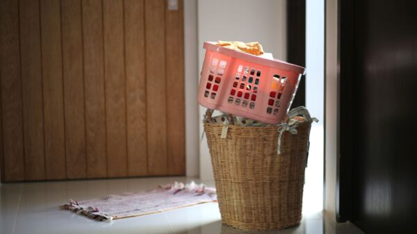 Laundry baskets stacked by a doorway