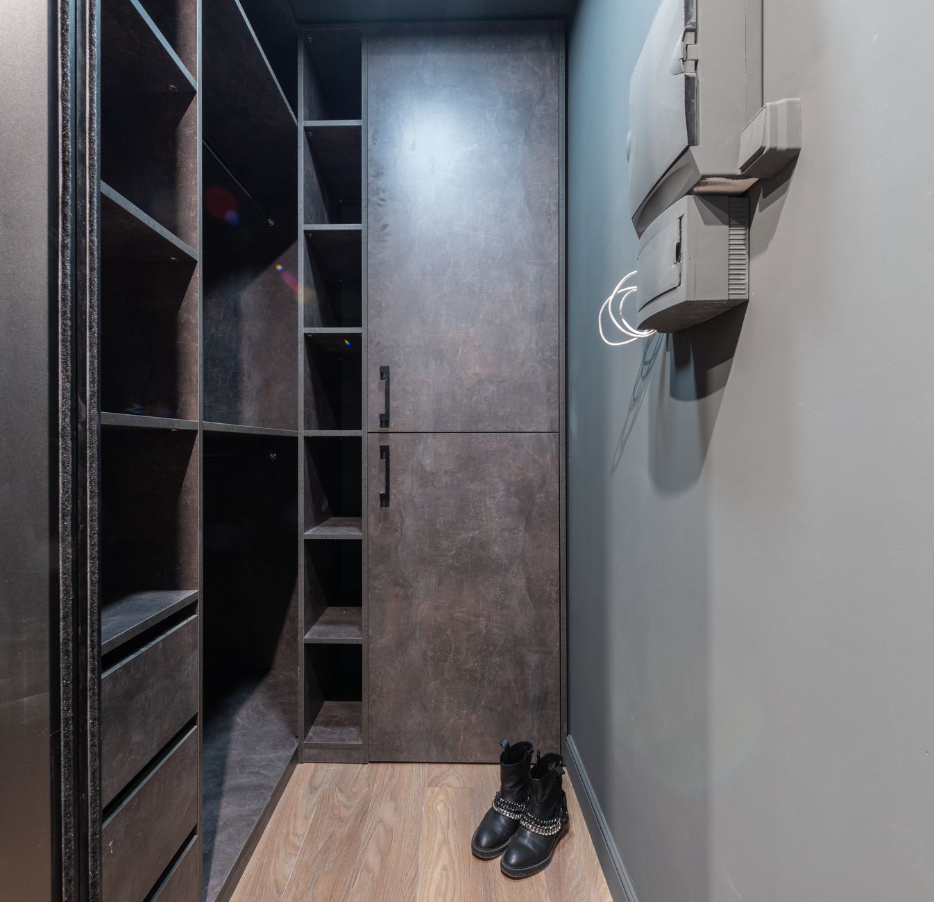 Built-in closet shelves in a dark room