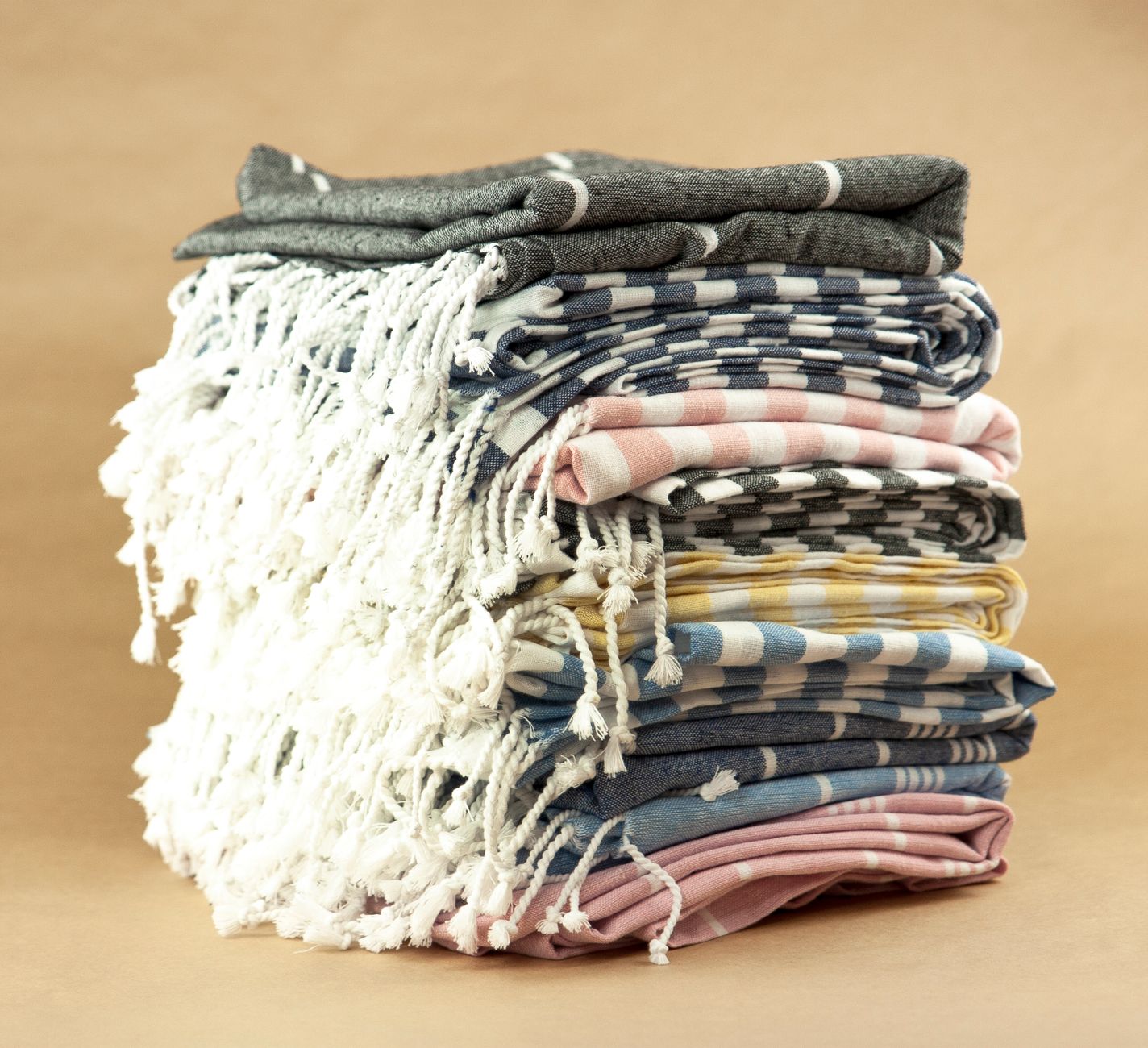 A stack of folded striped towels