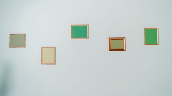 Best level for home projects: a picture frame being hung on a wall