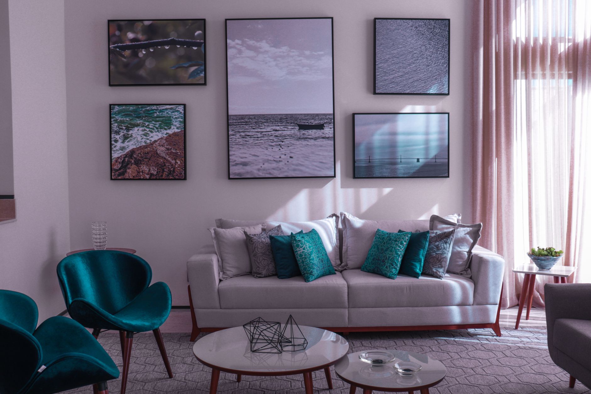 Framed pictures arranged on a living room wall