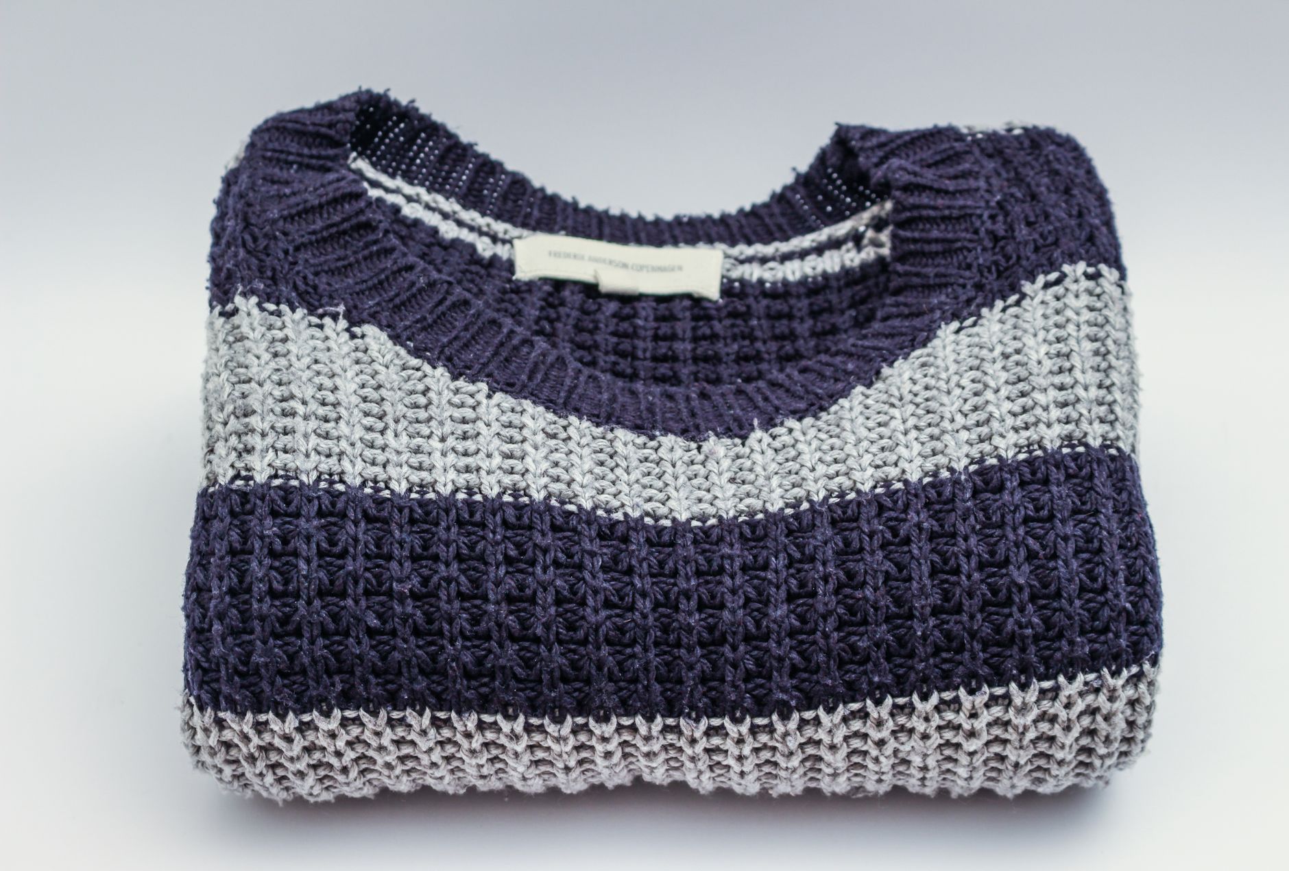 A folded striped sweater