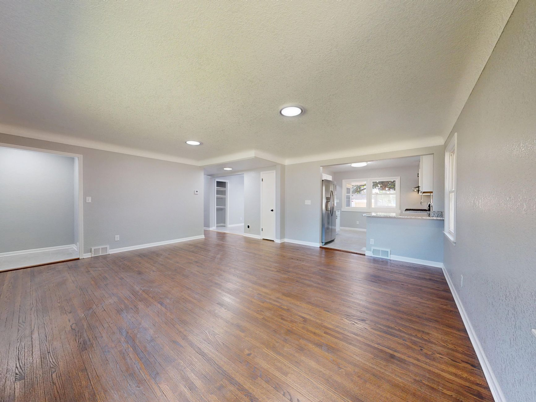 A hardwood floor in a living room