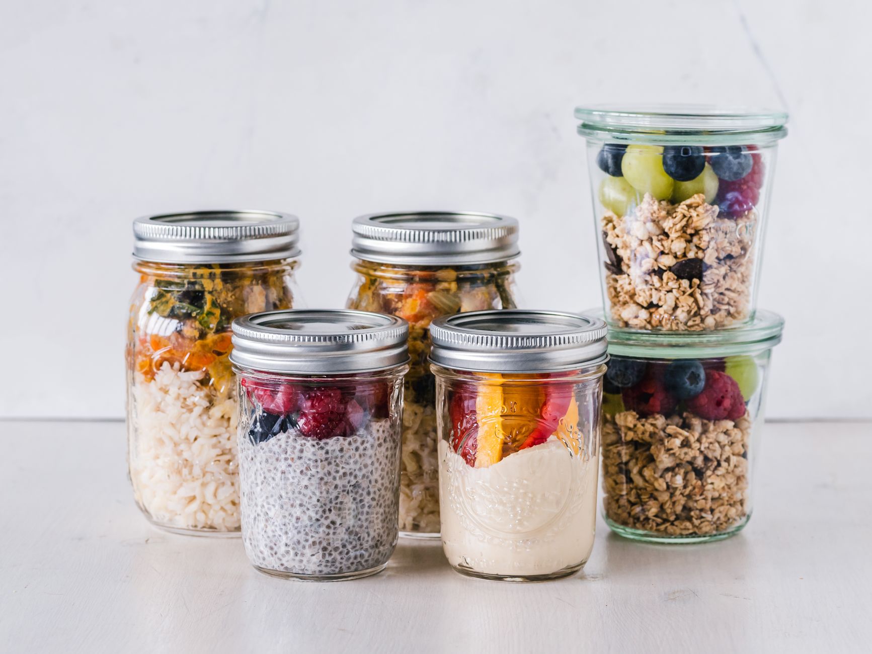 Mason jars of overnight oats and salads