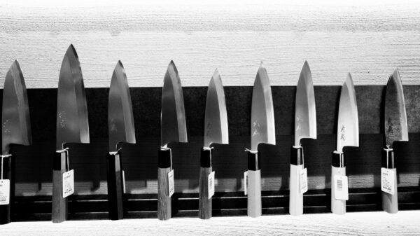 Best magnetic knife strip: a row of kitchen knives on display
