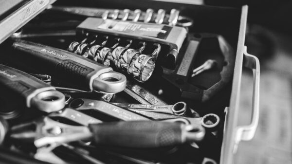 Best magnetic parts tray: hand tools laid out in a home garage