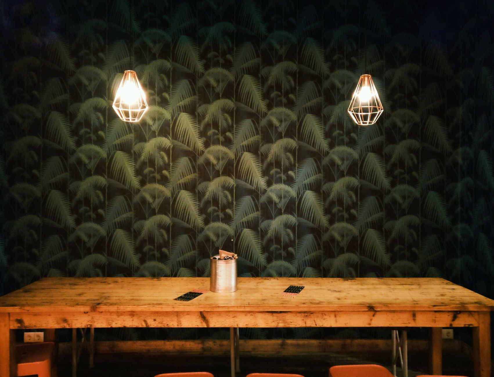 Pendant lights over a wooden table
