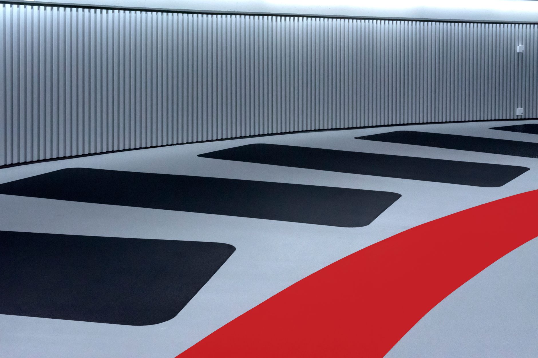 A garage floor with painted stripes