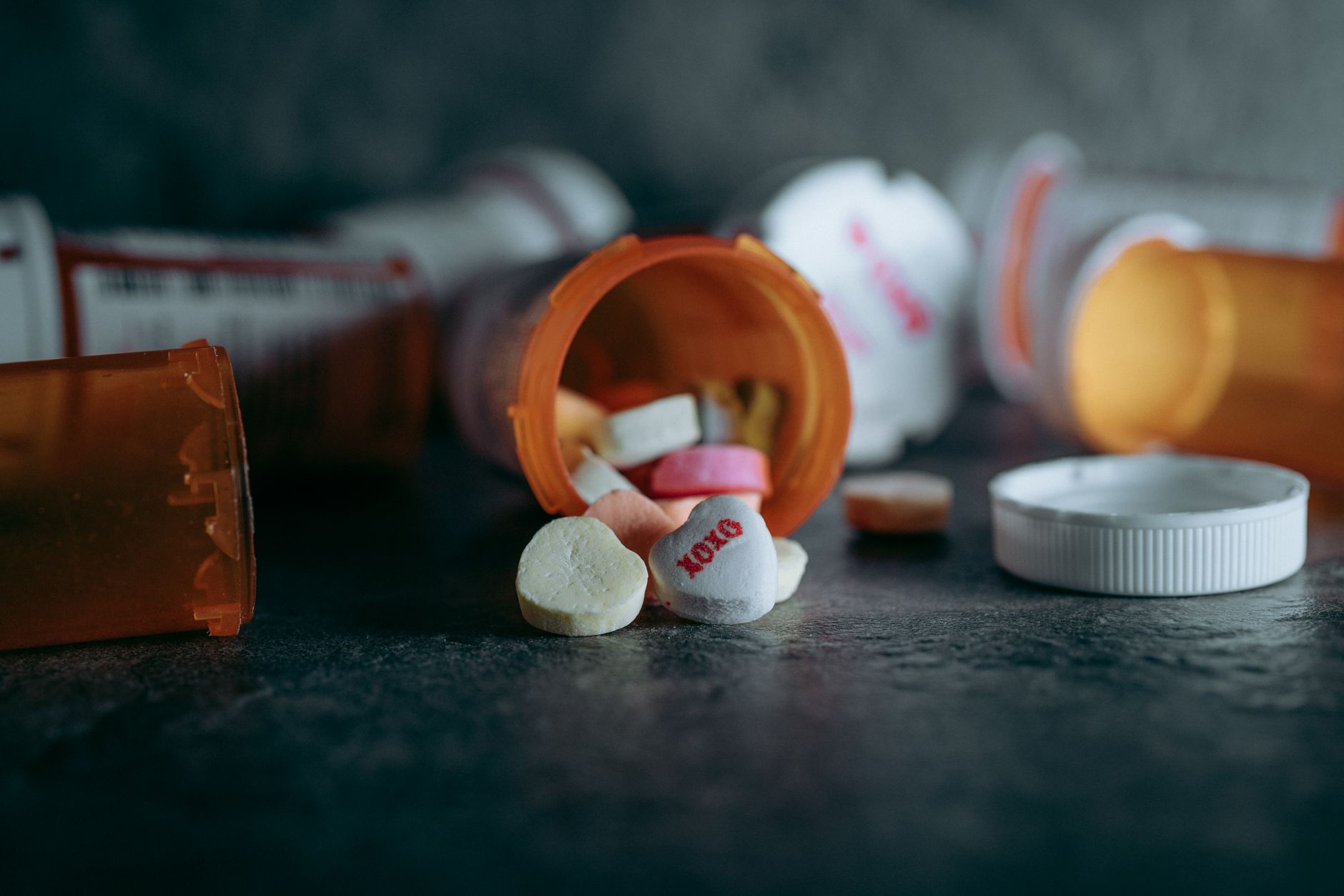 Medicine bottles and pills on a table
