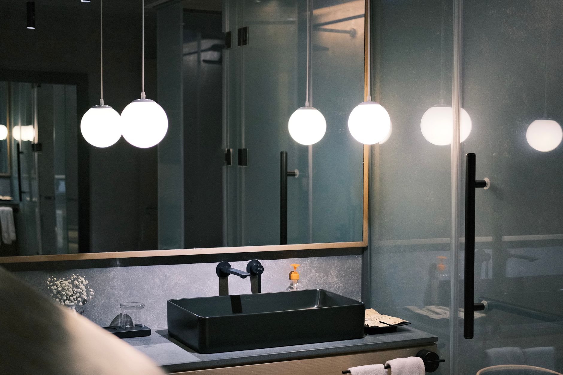 A modern bathroom with warm lighting