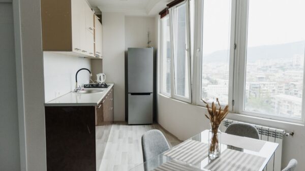 Best mini fridge stand: a bright apartment kitchen
